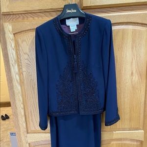 Neiman Marcus two-peace long skirt and zip up jacket evening wear.